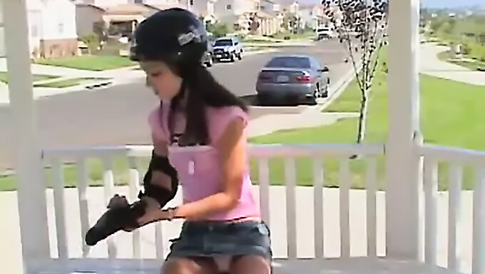 A young skater indulges in self-pleasure outdoors on a park bench