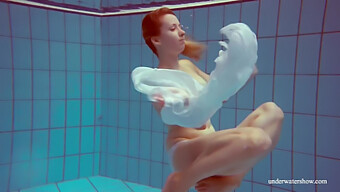 Melisa Darkova, A Fiery Young Vixen, Indulges In A Solo Swim While Baring It All