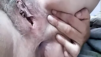 A Mature Woman'S Wet And Hairy Pussy On Display